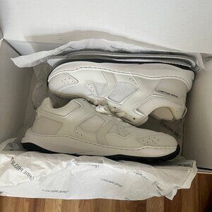 Women's White Athletic Sneakers with Contrasting Black Sole